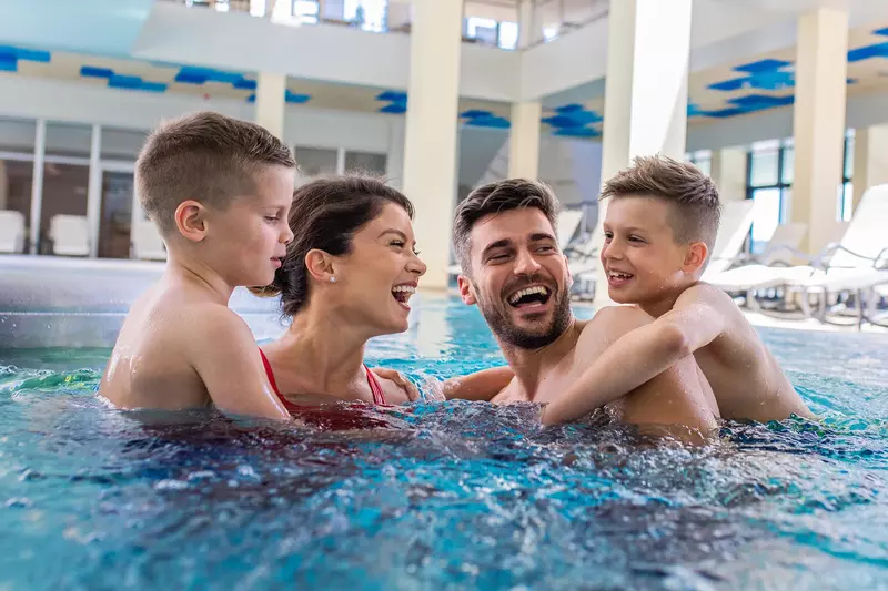 family-in-hotel-pool