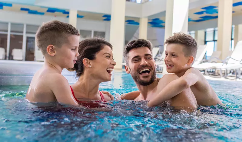 family-in-hotel-pool